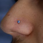 Nostril piercing by Matt Bressmer