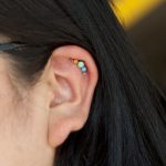 Helix piercing with rainbow Anatometal cluster