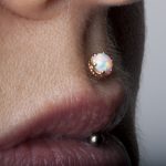 Philtrum piercing with Anatometal Queen end