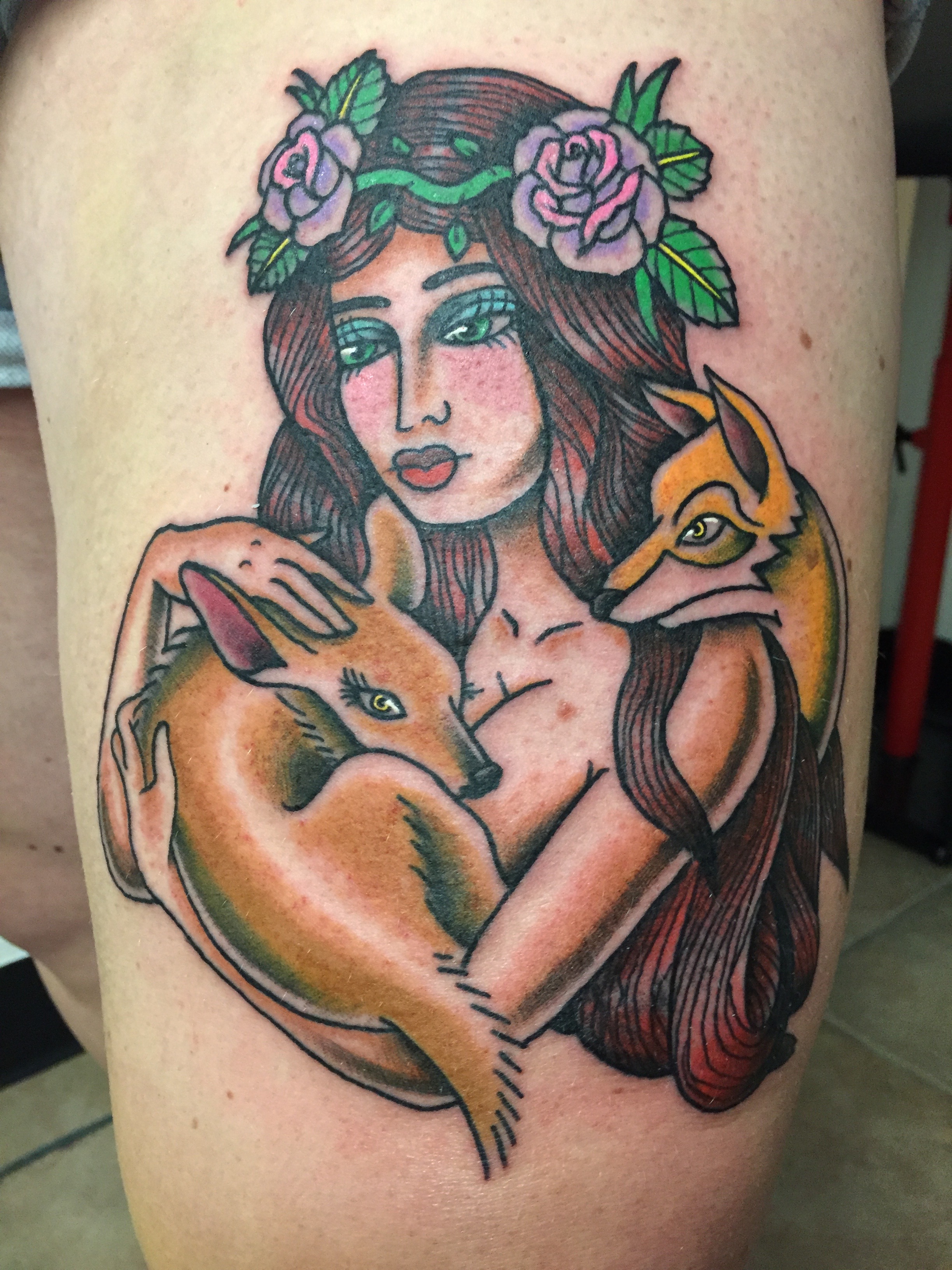 Teemu lady holding fawn tattoo