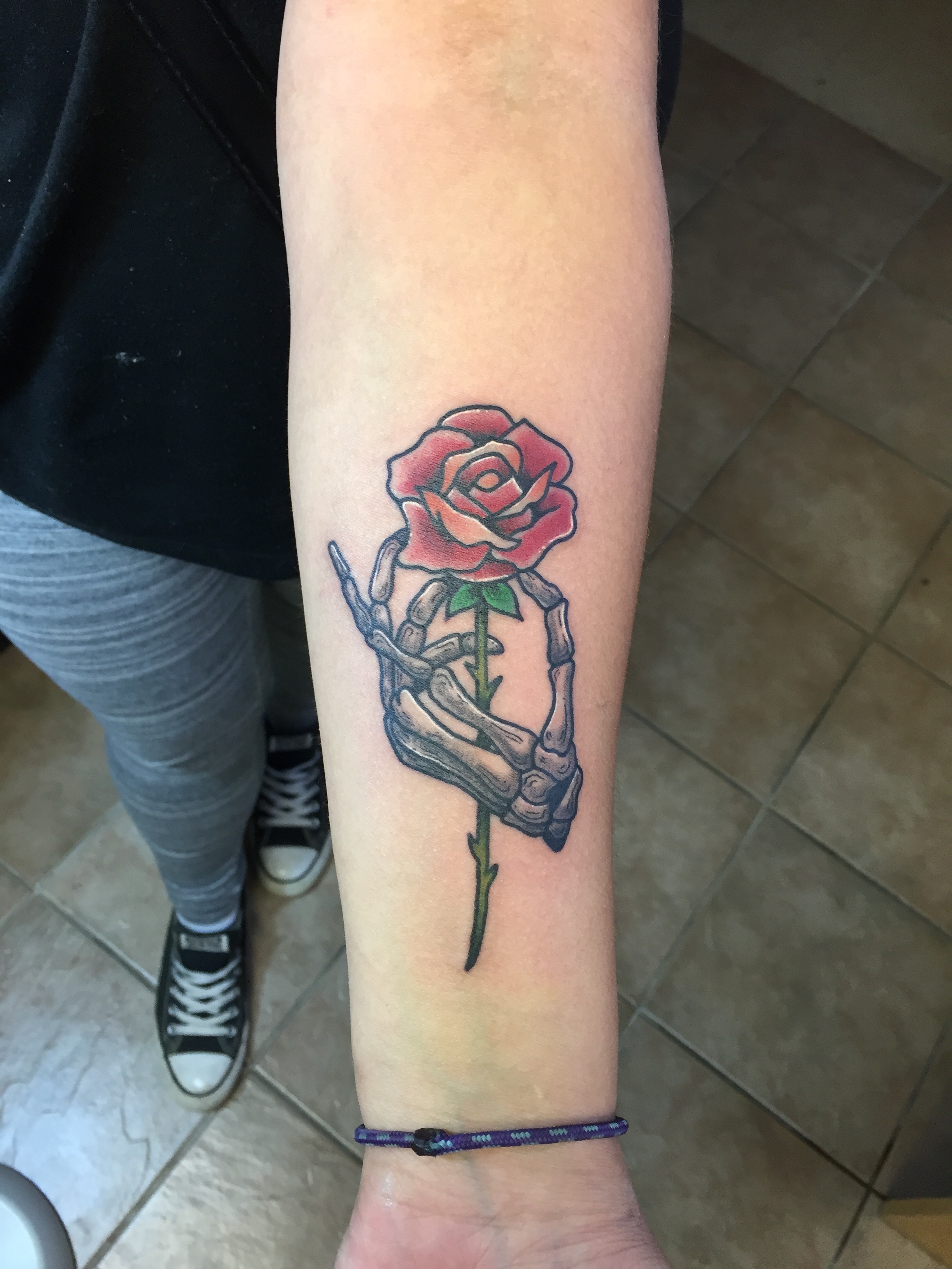 Teemu skeleton hand and rose
