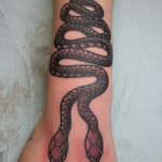 James Jameserson two headed snake tattoo